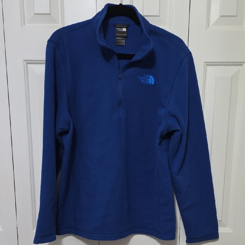 The North Face Glacier or Polartec Classic 1/4-Zip fleece pullover.
